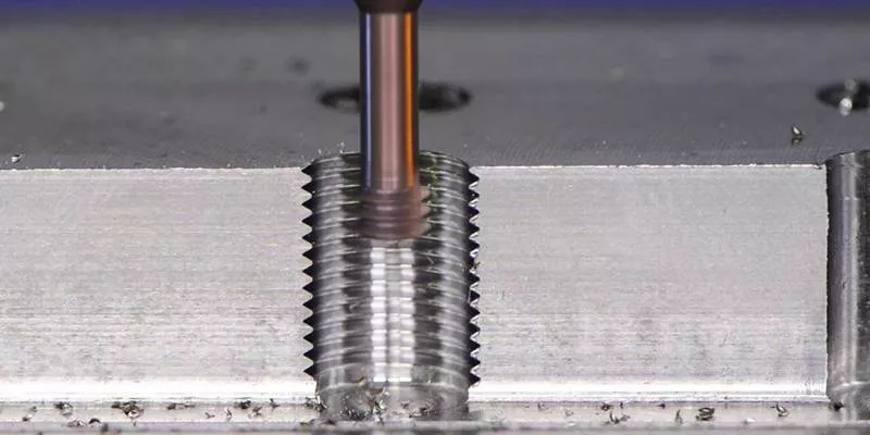 Cross-sectional view of internal thread turning using partial profile carbide threading insert